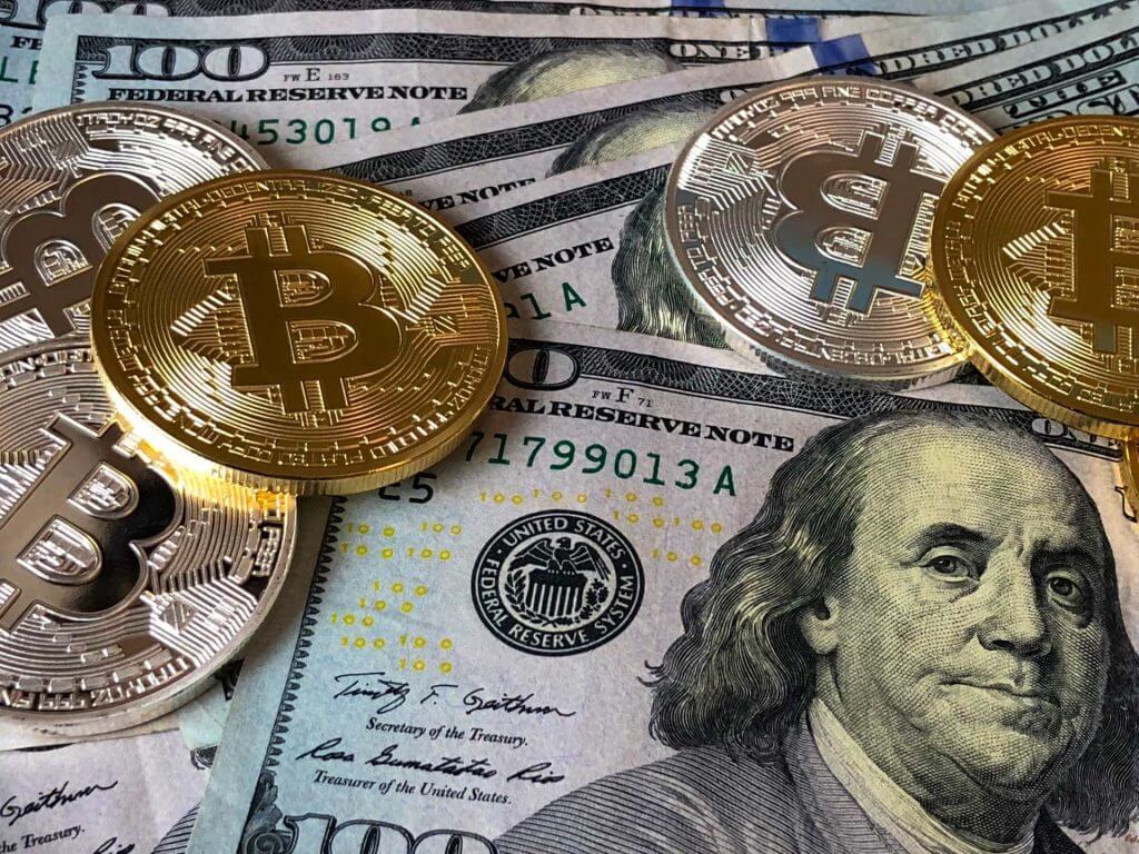 Bitcoins y dólares